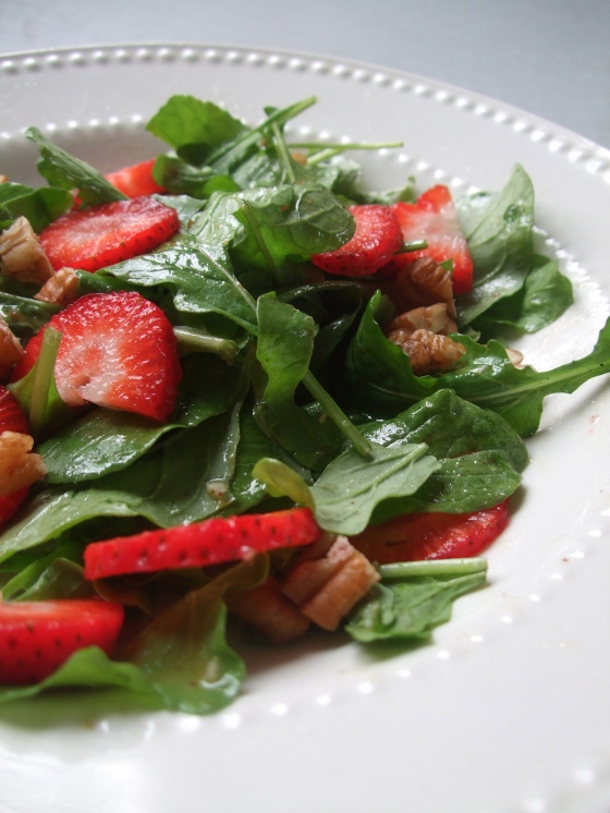 My local meal: Arugula salad with strawberries and pecans, topped with a homemade honey mustard vinaigrette. One of Southern Louisiana's gifts to us this time of year.